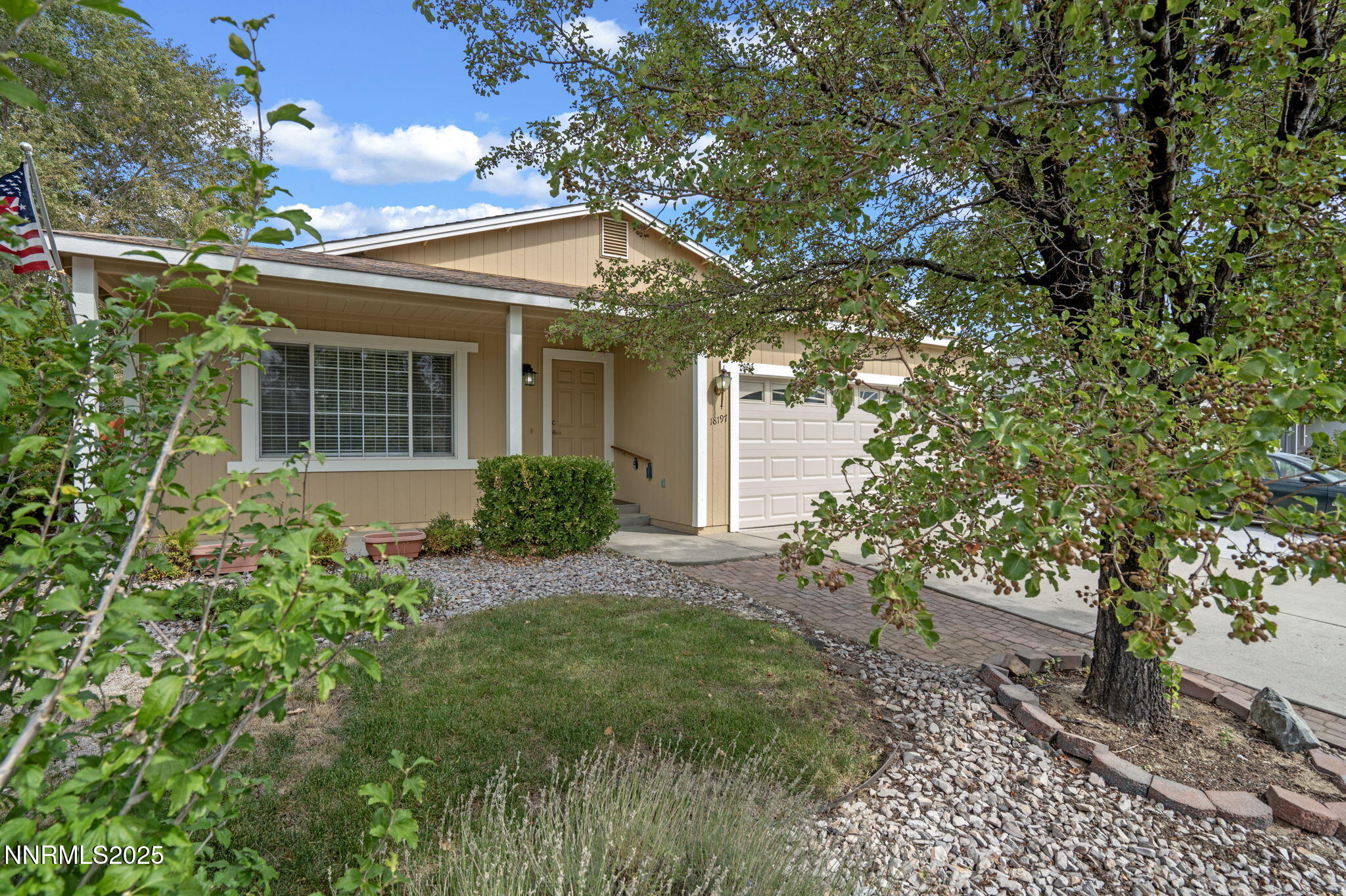 18197 Almondleaf Court Reno, NV 89508 - Photo 4 of 34 a view of a house with a tree
