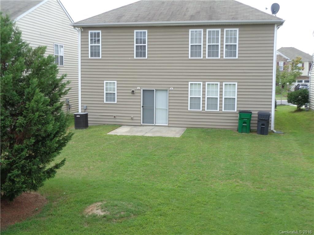 6517 Del Rio Road Charlotte, NC 28277 - Photo 15 of 15 a view of a house with a backyard