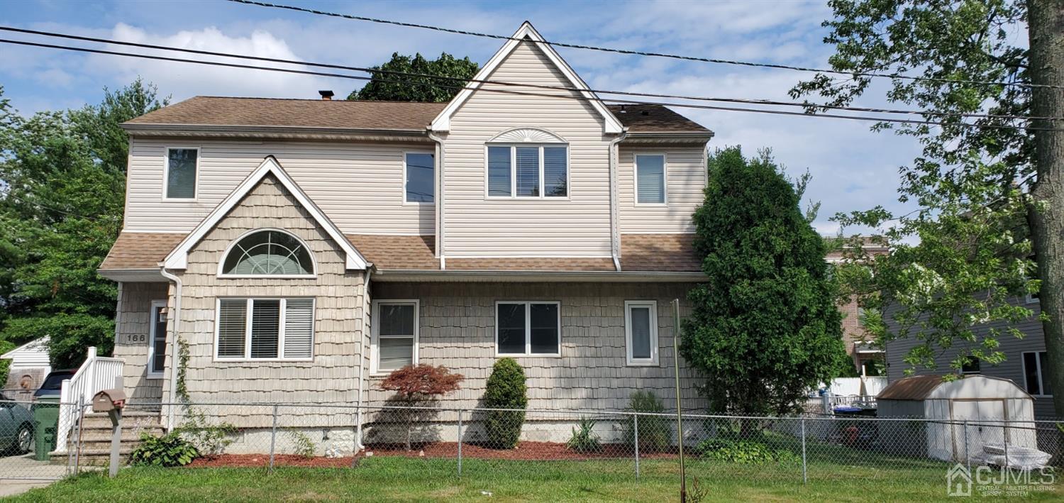 a view of house with garden