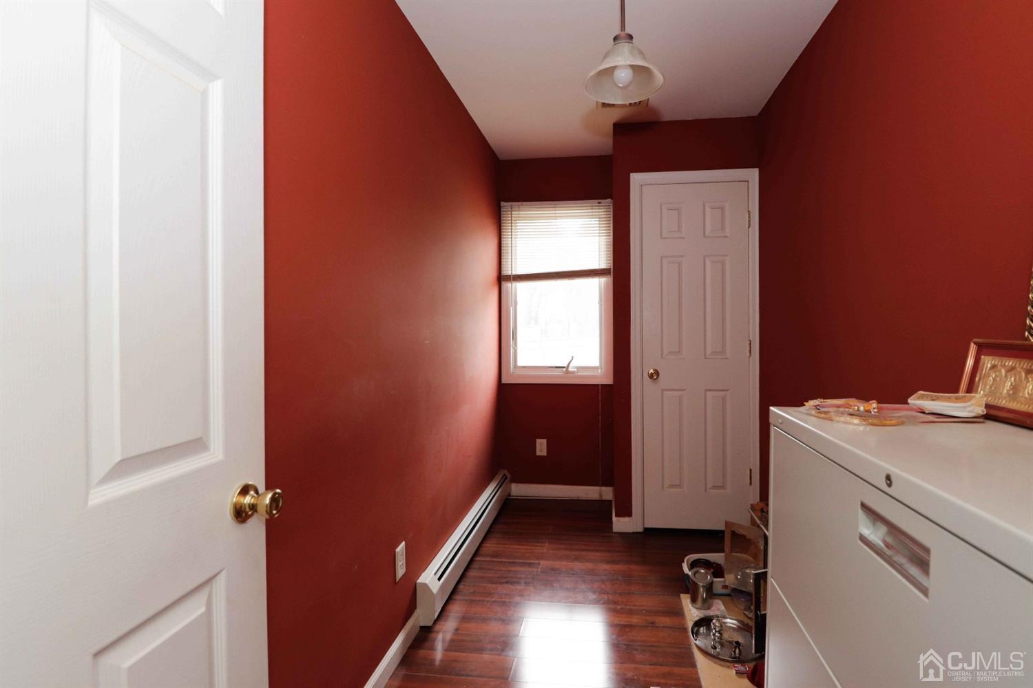 166 Brower Avenue Edison, NJ 08837 - Photo 24 of 48 a room that has a bed and a window