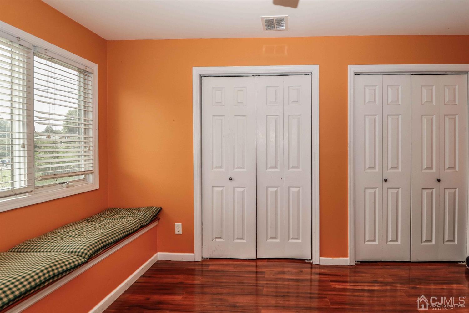 166 Brower Avenue Edison, NJ 08837 - Photo 29 of 48 a view of a room with wooden floor and cabinet