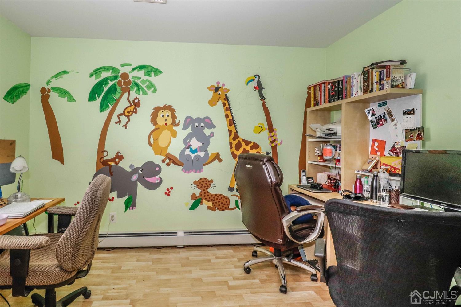 166 Brower Avenue Edison, NJ 08837 - Photo 34 of 48 a view of a workspace with furniture and toys