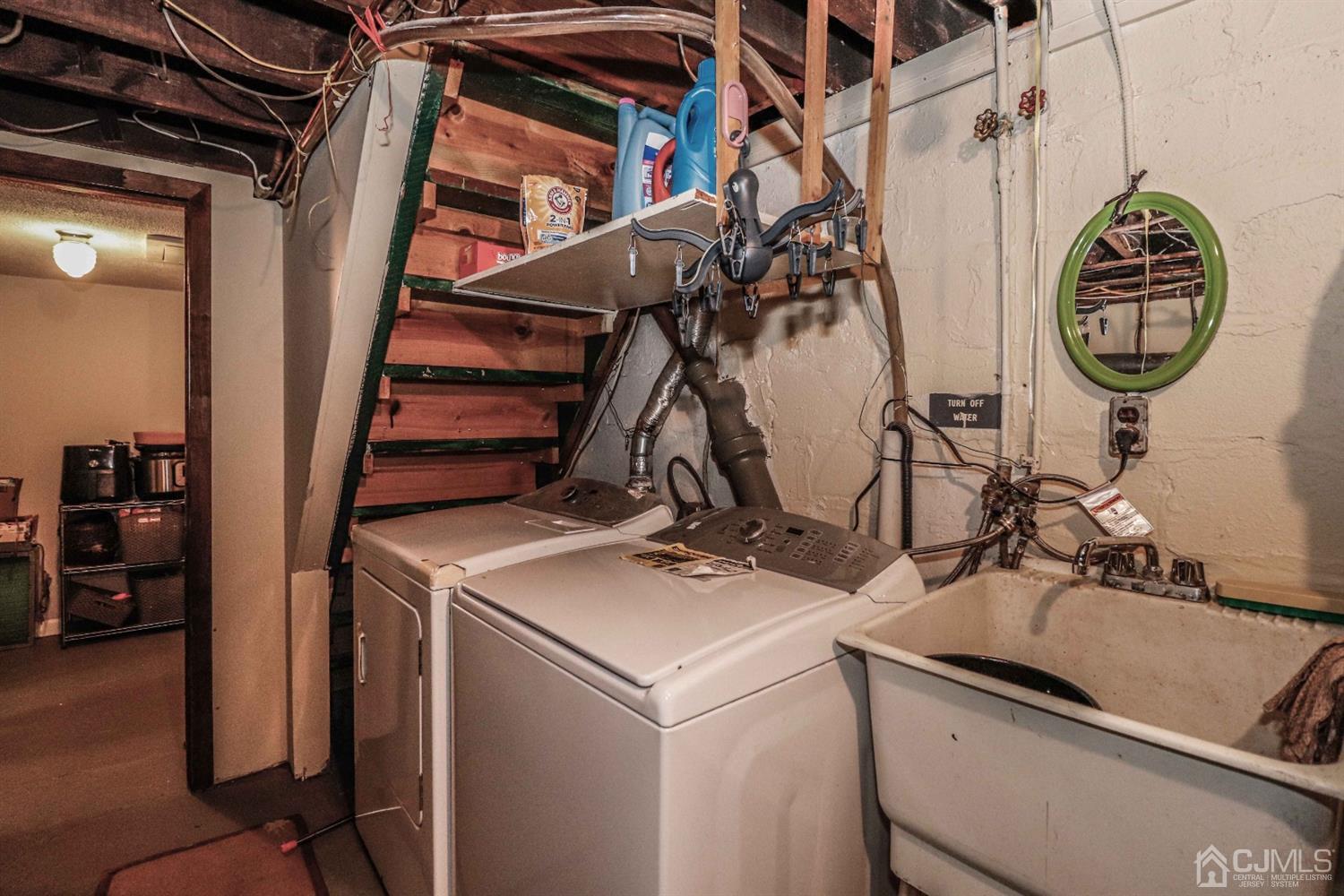 166 Brower Avenue Edison, NJ 08837 - Photo 41 of 48 a utility room with dryer and washer