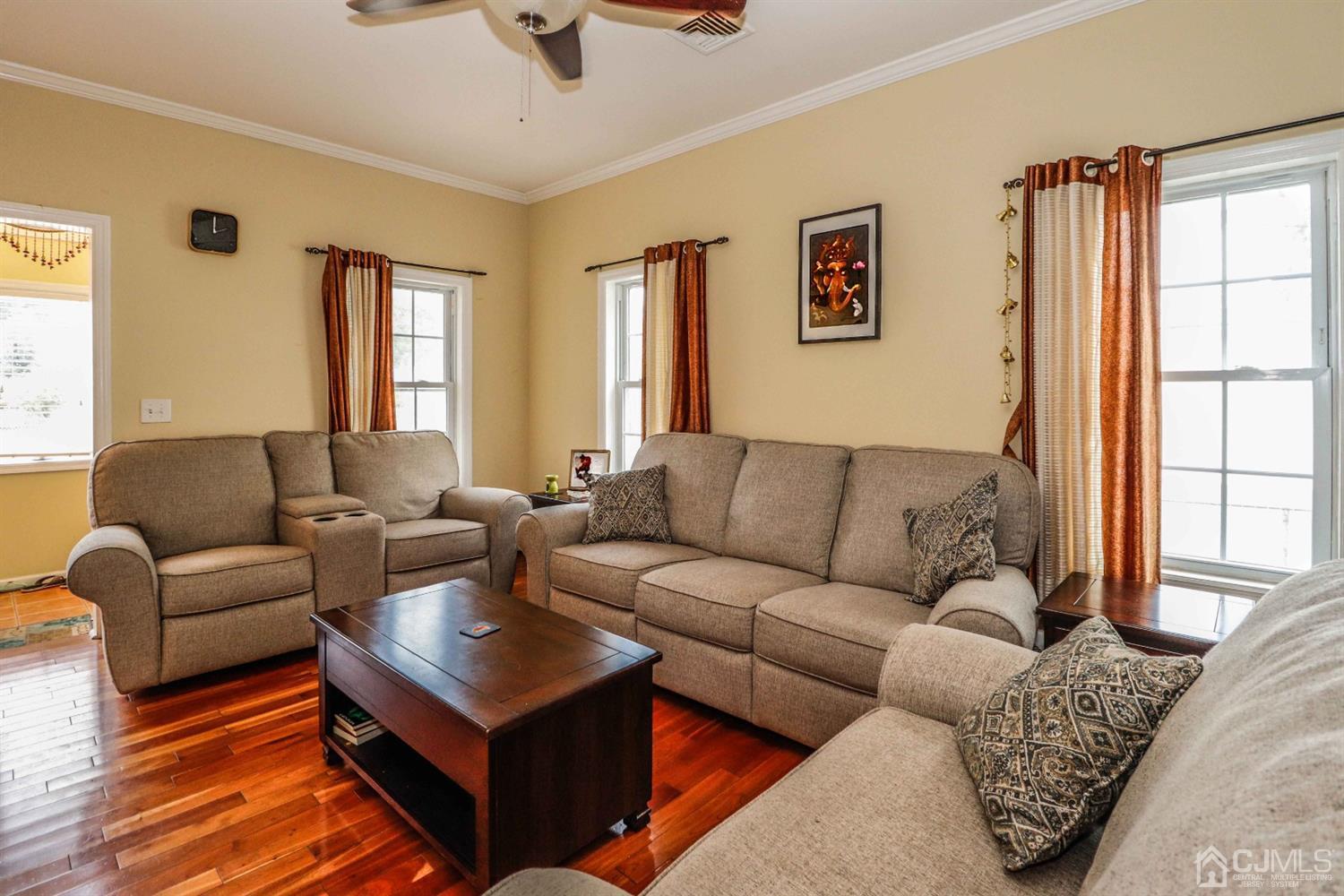 166 Brower Avenue Edison, NJ 08837 - Photo 10 of 48 a living room with furniture and a window