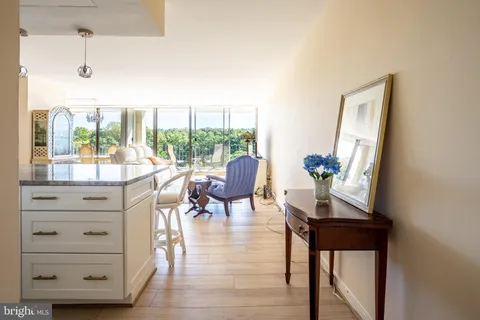 a workspace with furniture and a window