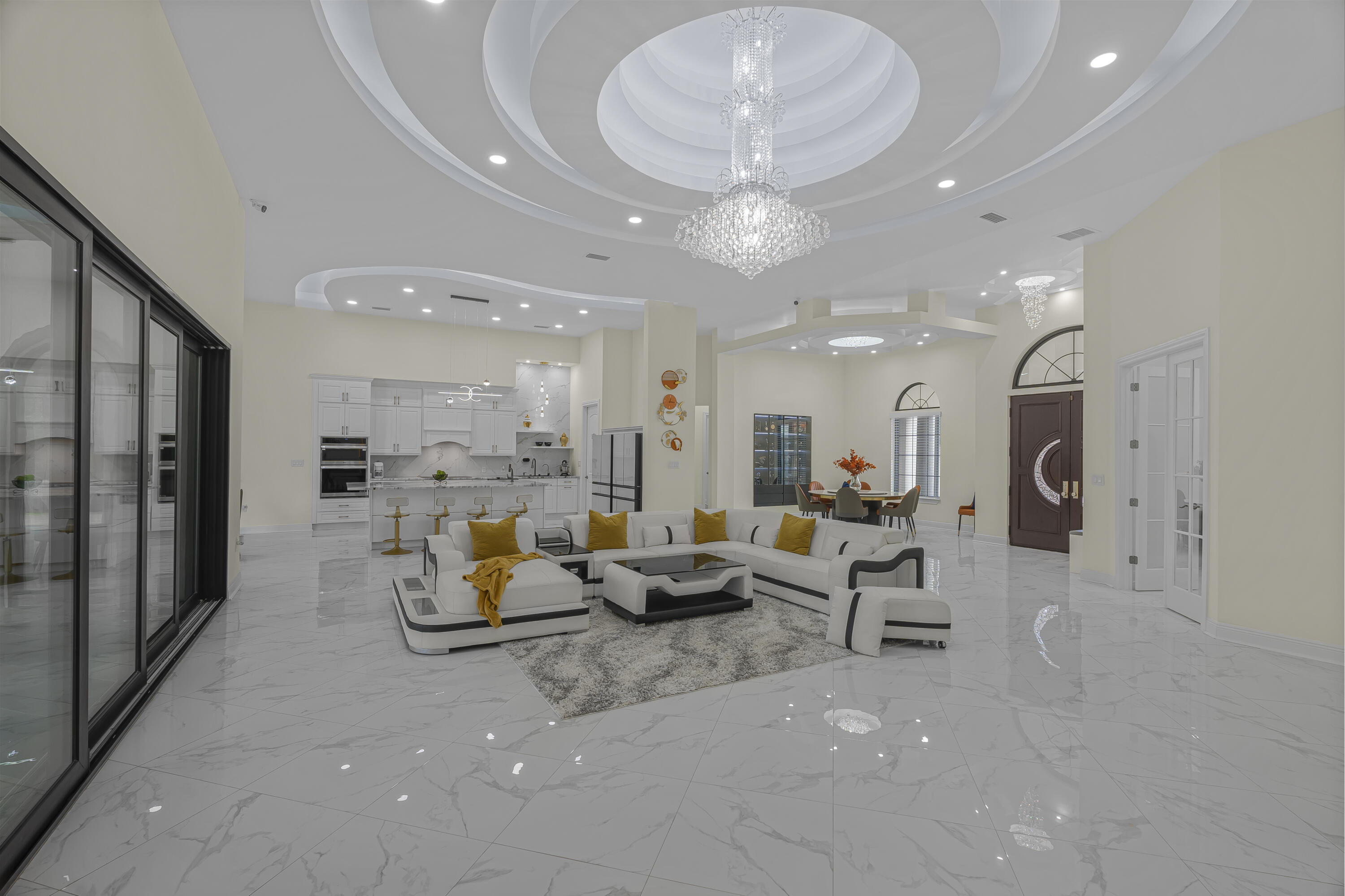 8073 Thoroughbred Road Pensacola, FL 32526 - Photo 22 of 65 a living room with furniture kitchen view and a chandelier