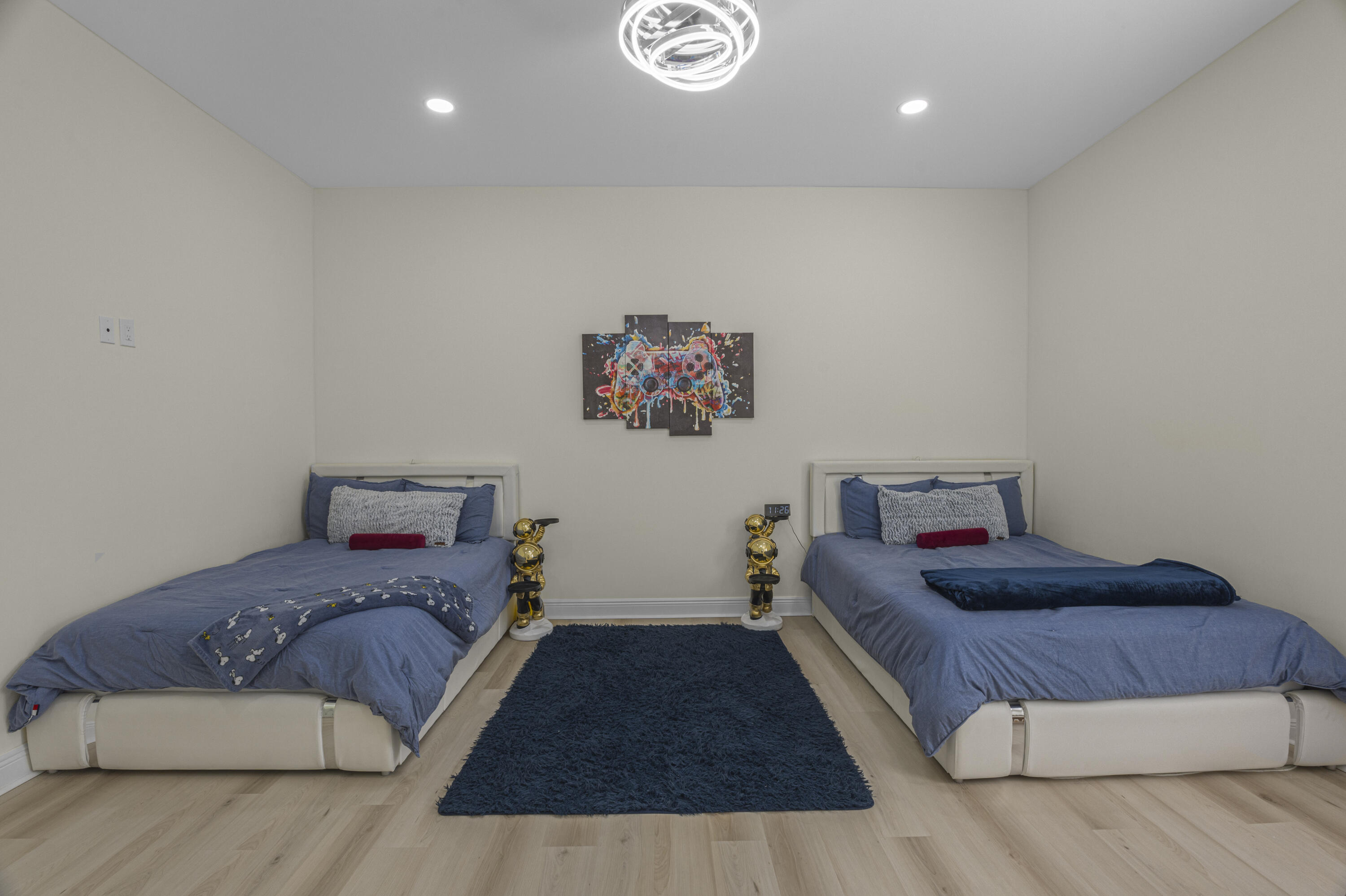 8073 Thoroughbred Road Pensacola, FL 32526 - Photo 27 of 65 a bedroom with a large bed and a couch