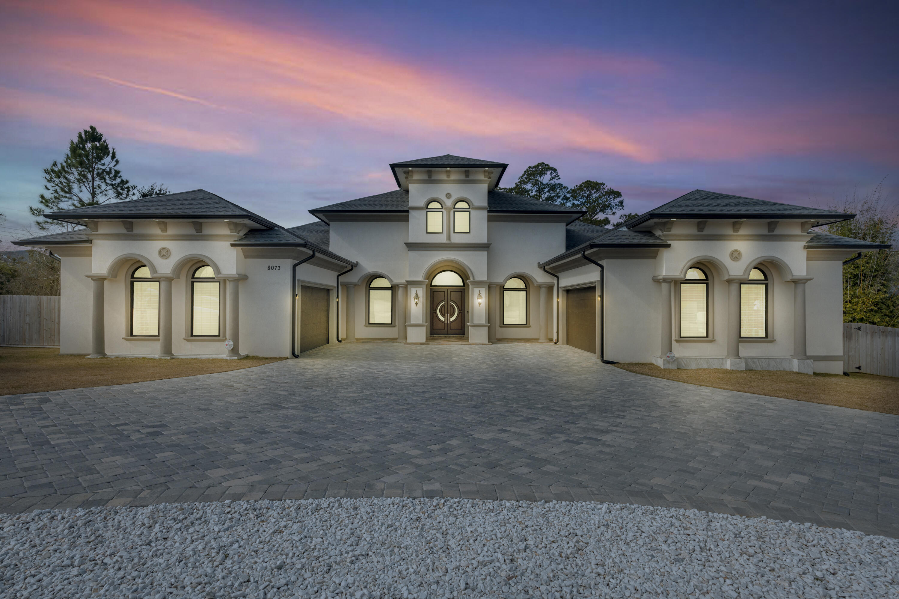 8073 Thoroughbred Road Pensacola, FL 32526 - Photo 3 of 65 a front view of a house with a yard