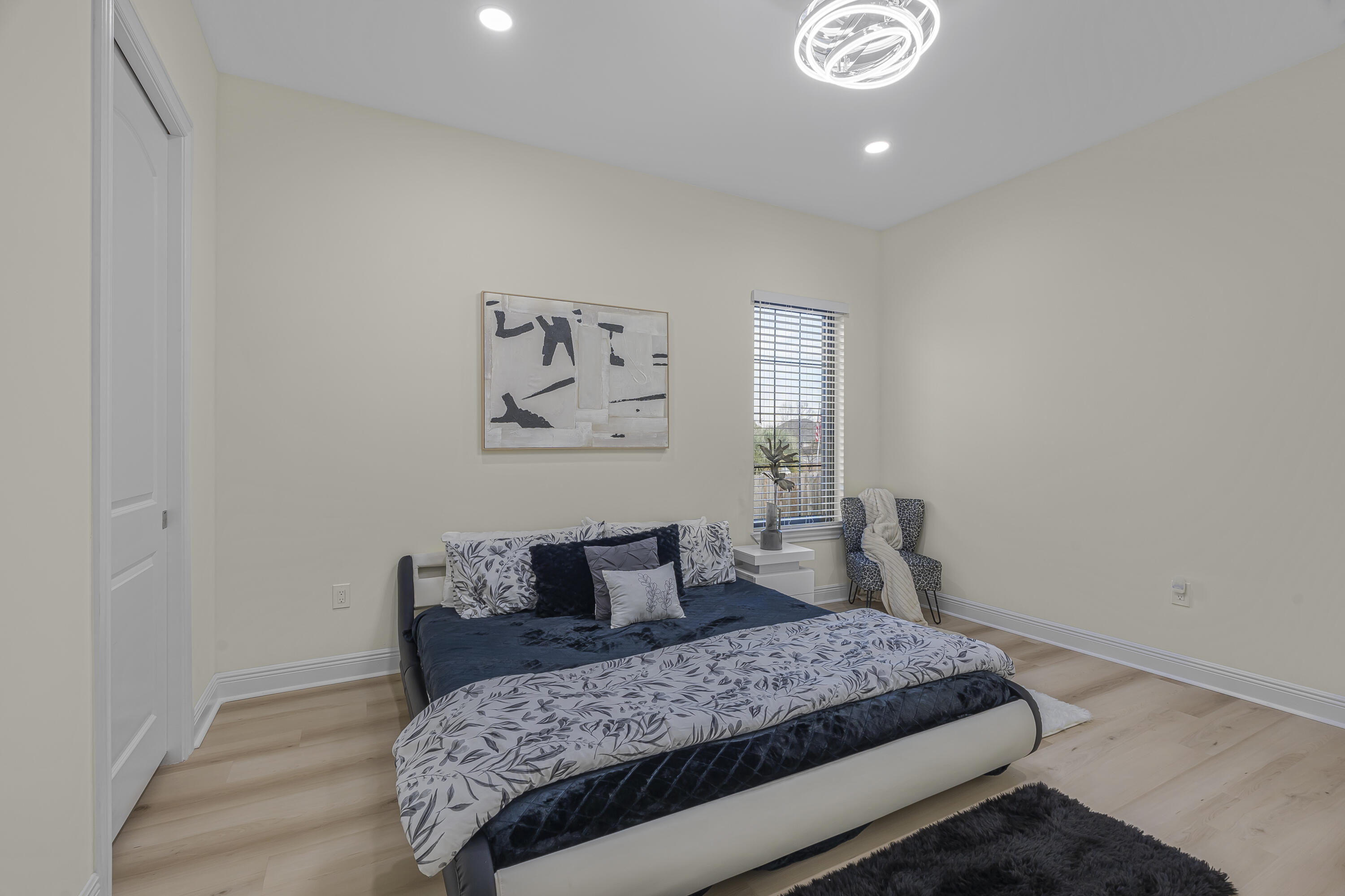 8073 Thoroughbred Road Pensacola, FL 32526 - Photo 32 of 65 a bedroom with a bed and painting on the wall