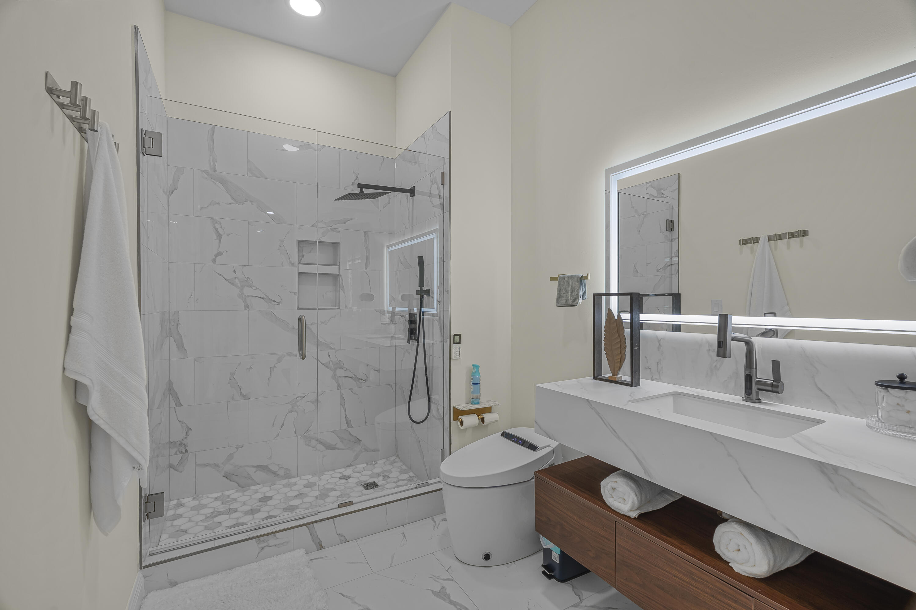 8073 Thoroughbred Road Pensacola, FL 32526 - Photo 33 of 65 a bathroom with a granite countertop sink a toilet and shower