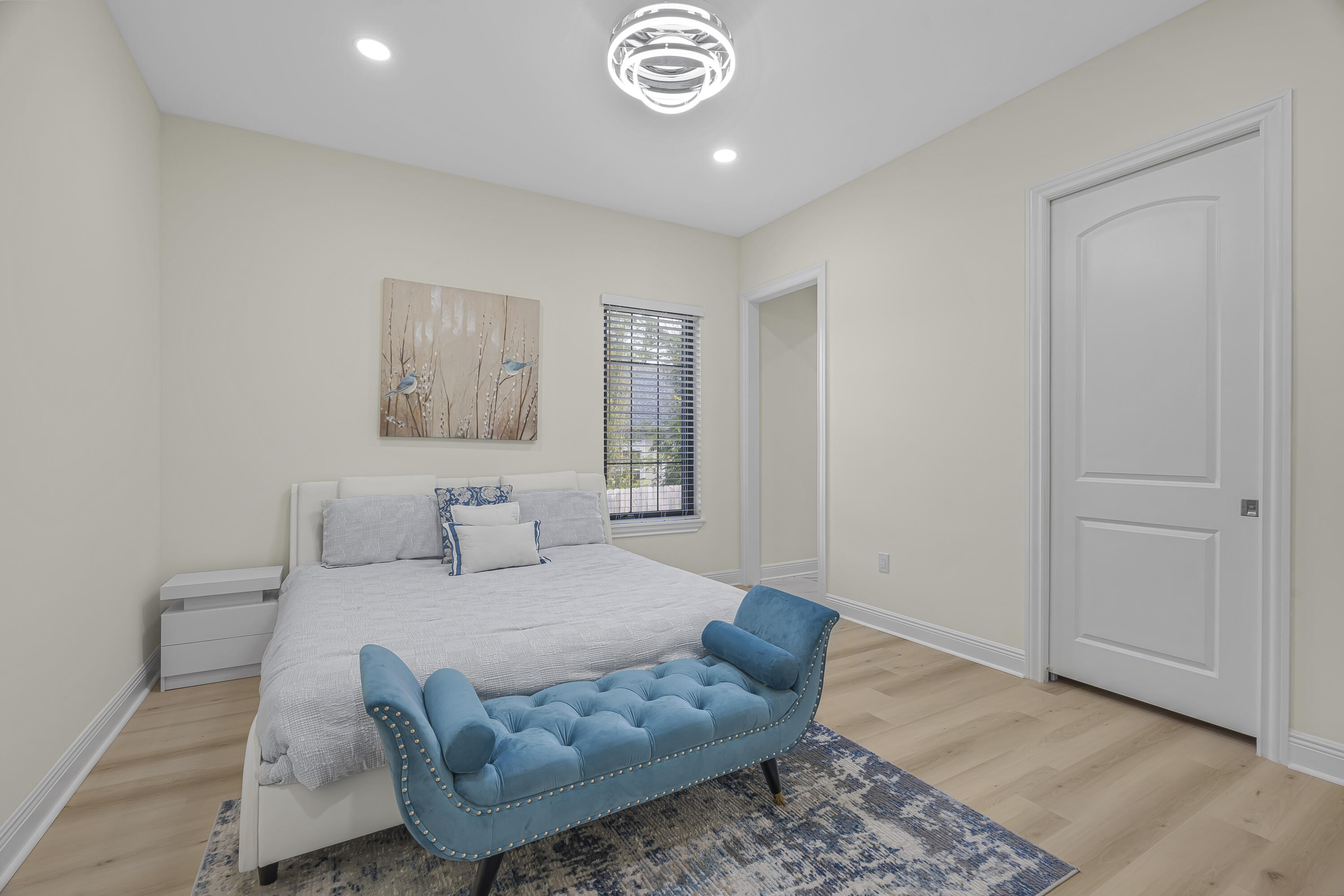 8073 Thoroughbred Road Pensacola, FL 32526 - Photo 35 of 65 a living room with furniture and a chandelier