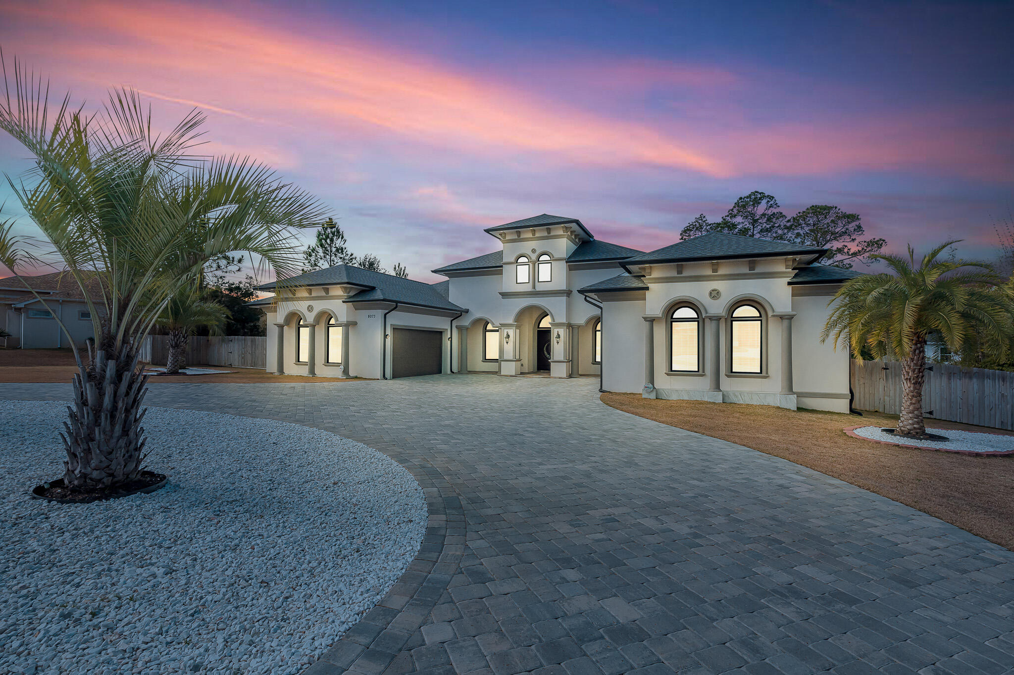 8073 Thoroughbred Road Pensacola, FL 32526 - Photo 4 of 65 a front view of a house with a yard and garage