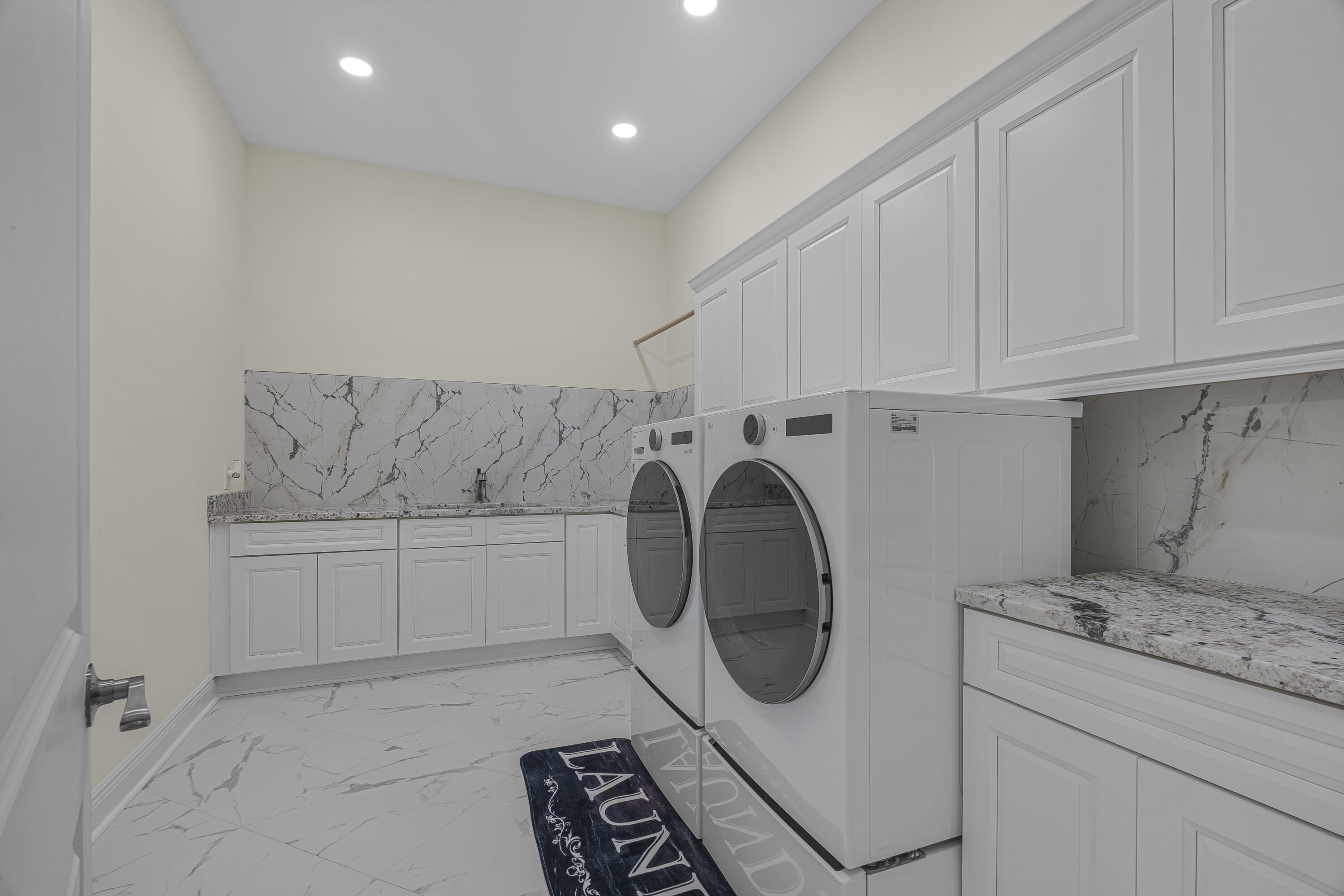 8073 Thoroughbred Road Pensacola, FL 32526 - Photo 47 of 65 a utility room with dryer and washer