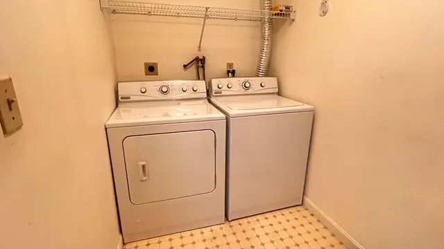 a view of a door and small bathroom