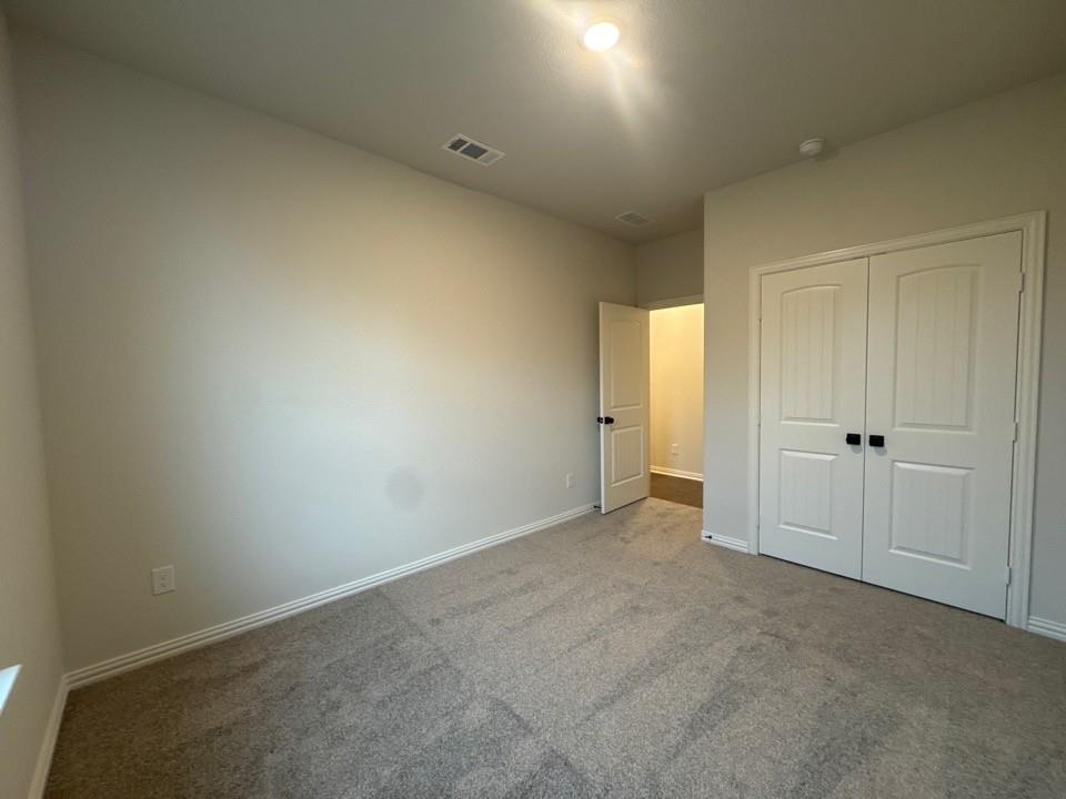 9013 County Road 623 Blue Ridge, TX 75424 - Photo 12 of 15 an empty room with an entryway