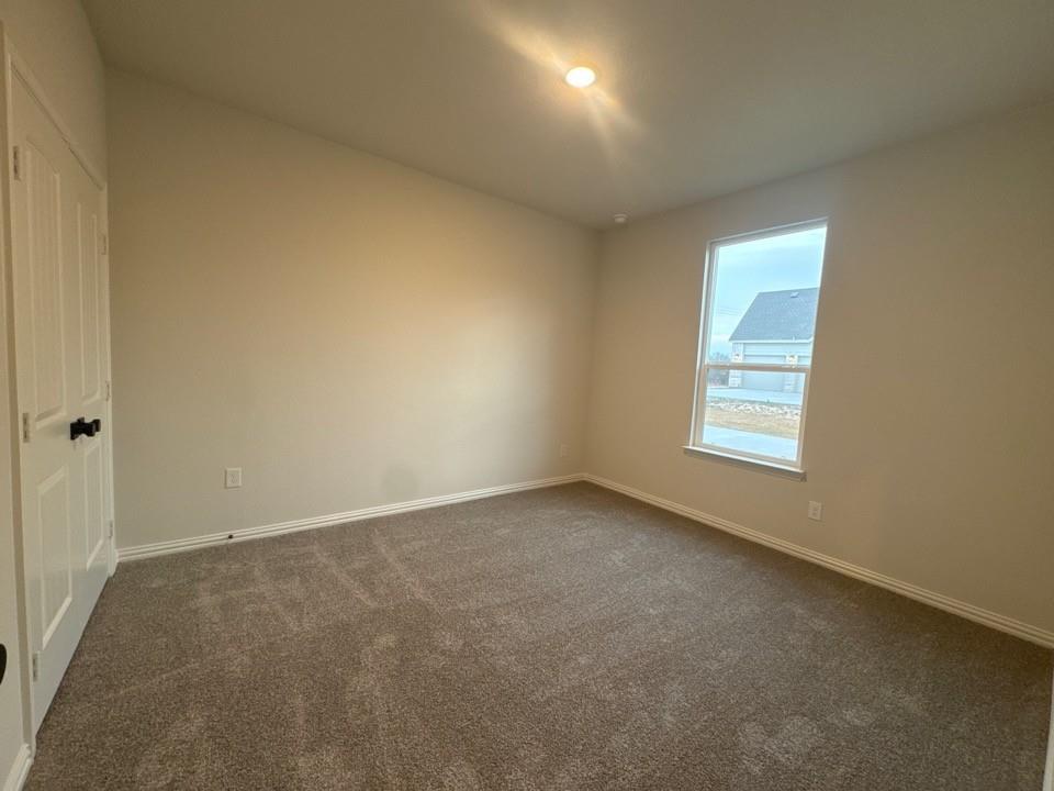 9013 County Road 623 Blue Ridge, TX 75424 - Photo 13 of 15 an empty room with a window