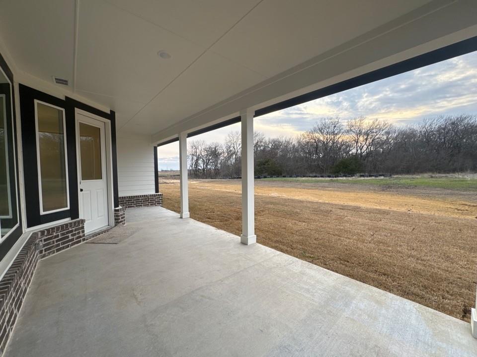 9013 County Road 623 Blue Ridge, TX 75424 - Photo 14 of 15 a view of an empty room with floor to ceiling windows