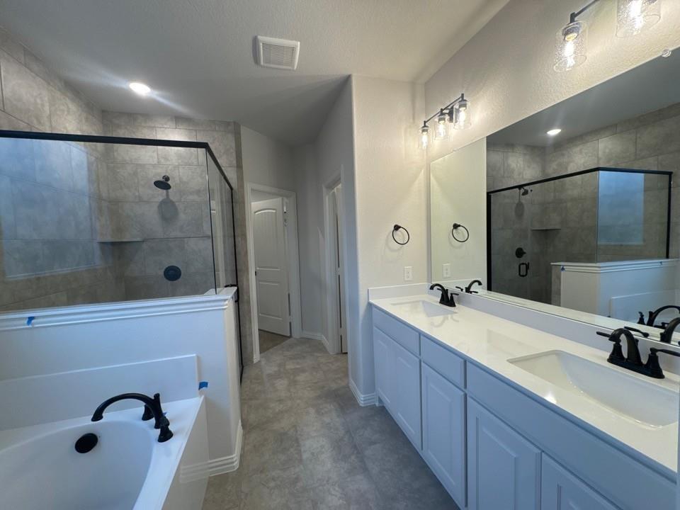9013 County Road 623 Blue Ridge, TX 75424 - Photo 10 of 15 a bathroom with a double vanity sink mirror and shower