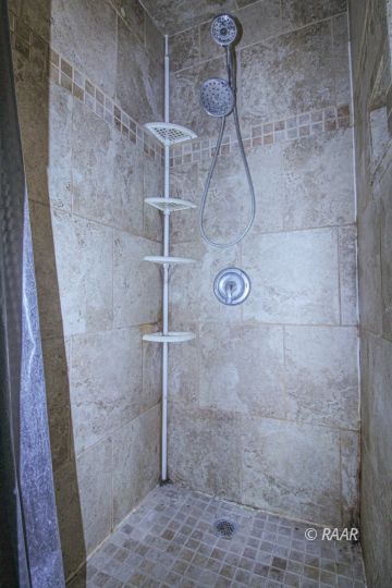1645 Porter Street Ridgecrest, CA 93555 - Photo 21 of 35 a bathroom with a shower