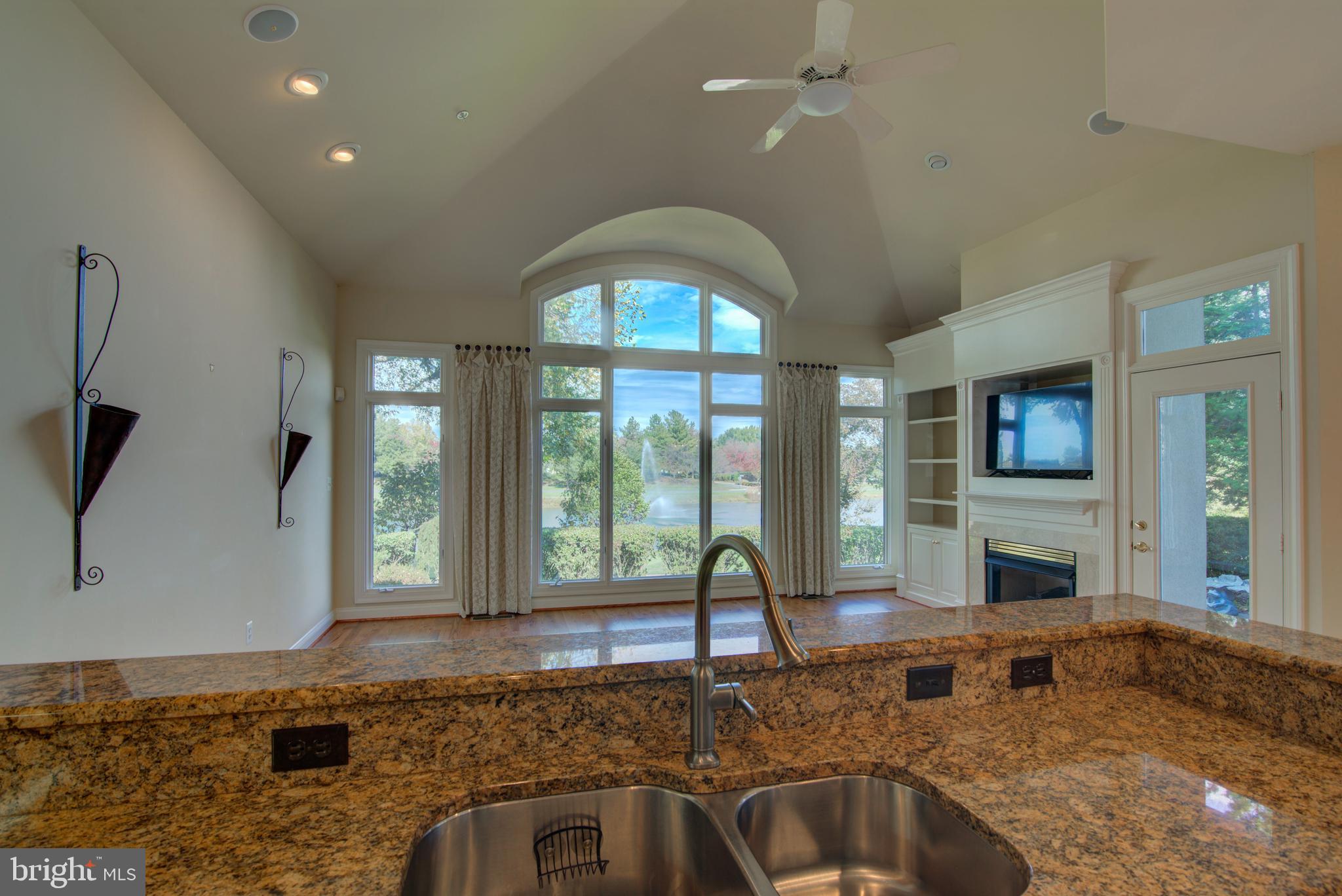 43462 Firestone Place Leesburg, VA 20176 - Photo 20 of 80 KITCHEN VIEW INTO FAMILY ROOM & GOLF COURSE
