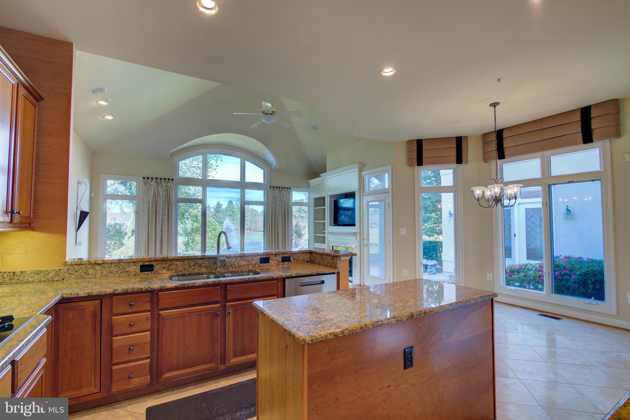 43462 Firestone Place Leesburg, VA 20176 - Photo 25 of 80 VIEW FROM KITCHEN TO PATIO & FAMILY ROOM