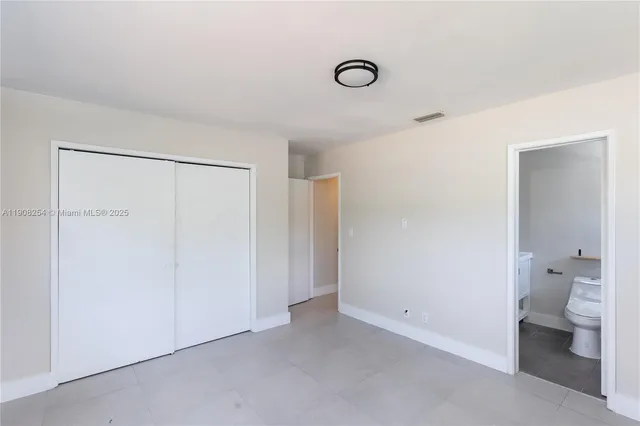 a view of bathroom with a toilet