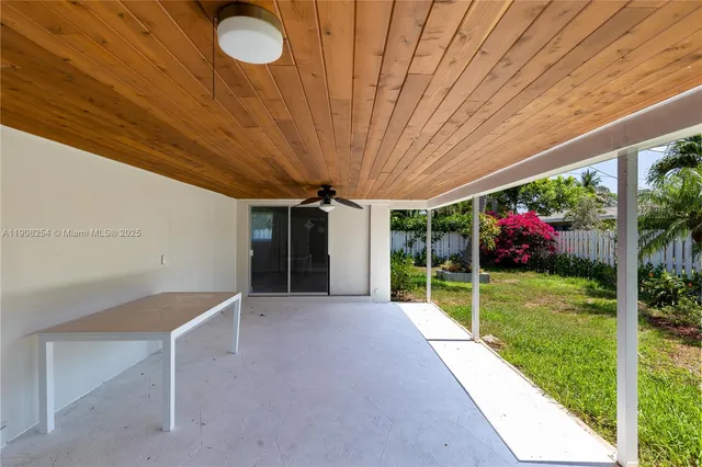 a view of backyard with garden and plants