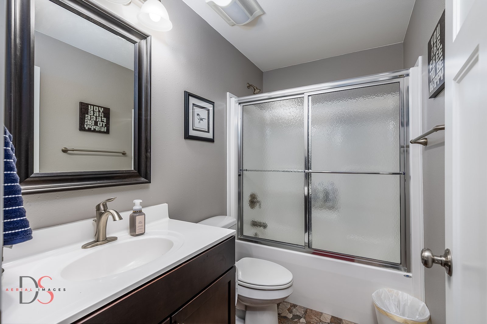 41 Waterside Way, Unit D Ottawa, IL 61350 - Photo 22 of 27 a bathroom with a sink toilet and shower