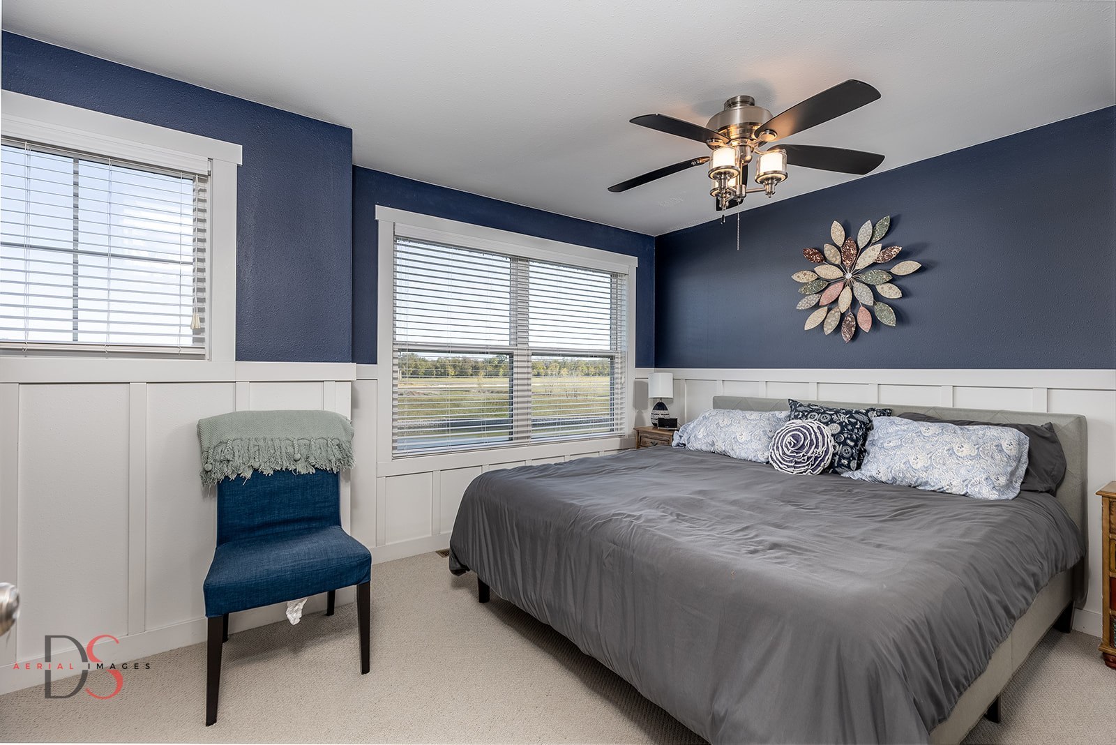 41 Waterside Way, Unit D Ottawa, IL 61350 - Photo 23 of 27 a bedroom with a bed and a chair