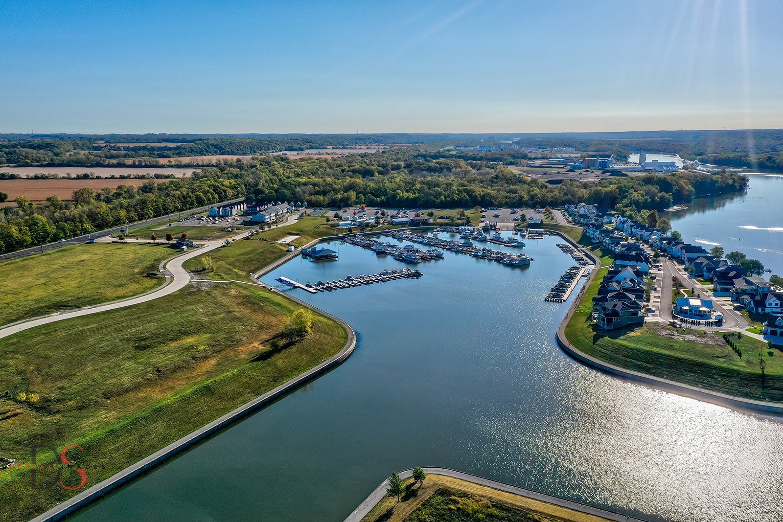 41 Waterside Way, Unit D Ottawa, IL 61350 - Photo 9 of 27 an aerial view of a residential building ocean and trees in the background