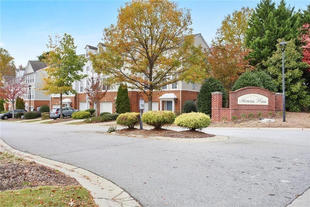 4081 Howell Park Road Duluth, GA 30096 - Photo 10 of 12 a front view of a house with a yard
