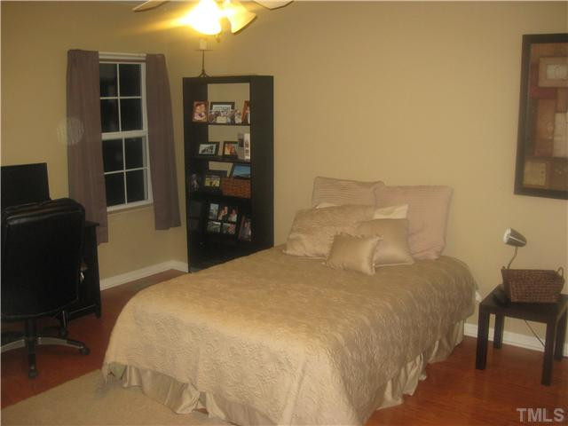 411 Hanson Road Durham, NC 27713 - Photo 5 of 16 Master suite with hardwoods and large walk-in closet Master Suite
