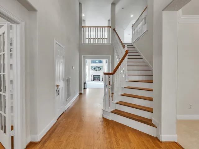 a view of entryway with wooden floor