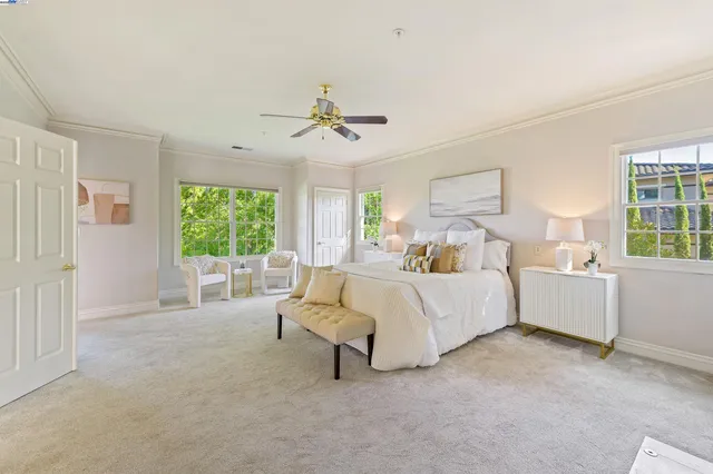 a bed room with a bed and a window