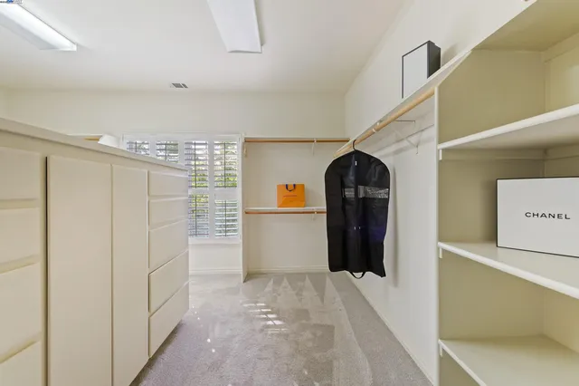 a view of a entryway door with hallway