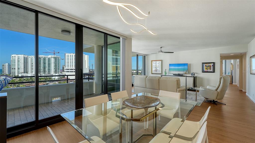 1255 North Gulfstream Avenue, Unit 1101 Sarasota, FL 34236 - Photo 21 of 75 a view of a dining room with furniture