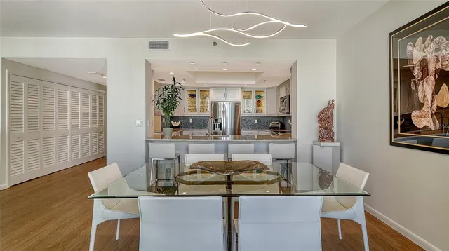 a bathroom with a double vanity sink and mirror