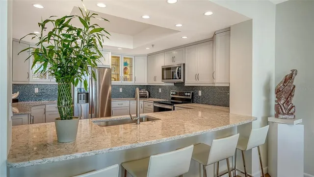 a view of a hallway with windows