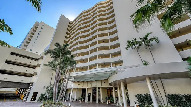 a view of a chair and table in the patio