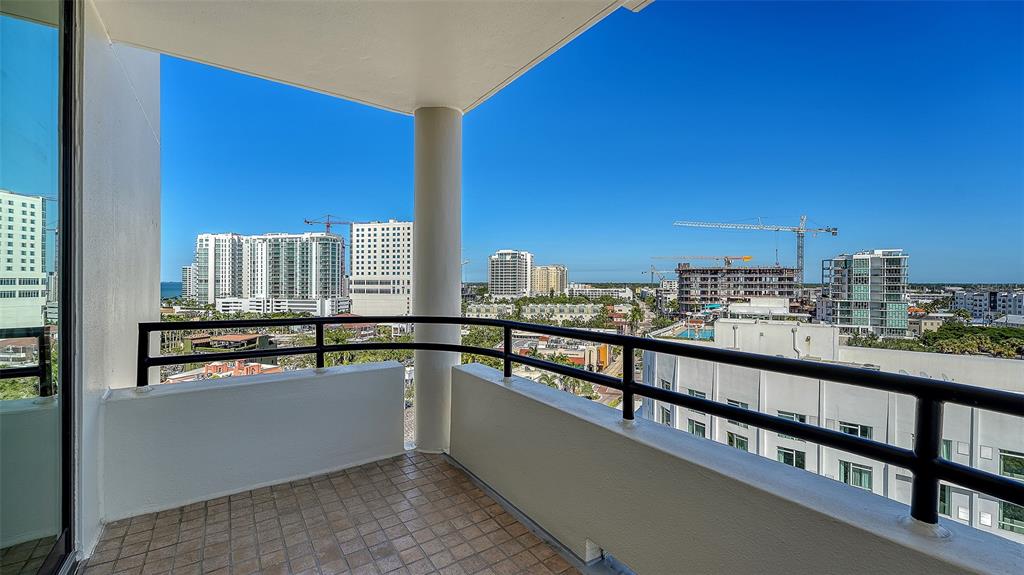 1255 North Gulfstream Avenue, Unit 1101 Sarasota, FL 34236 - Photo 37 of 75 a view of a kitchen with kitchen island and a window