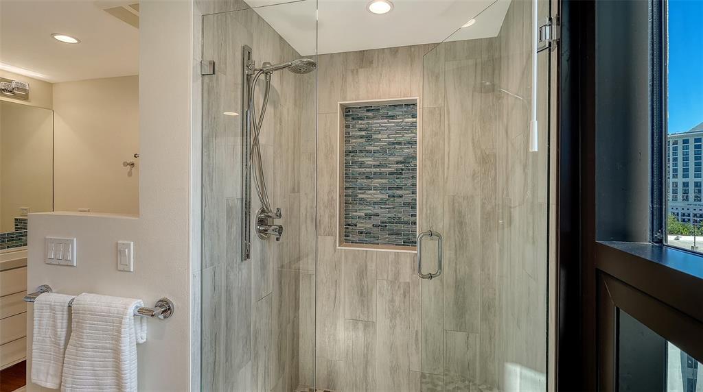 1255 North Gulfstream Avenue, Unit 1101 Sarasota, FL 34236 - Photo 42 of 75 a bathroom with a shower and a tub