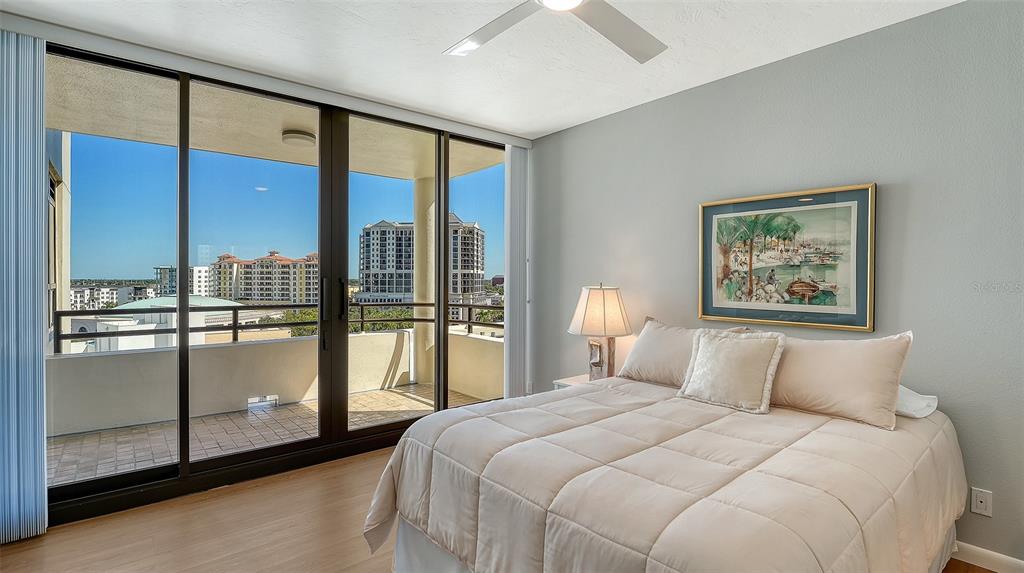 1255 North Gulfstream Avenue, Unit 1101 Sarasota, FL 34236 - Photo 46 of 75 a bedroom with a large window