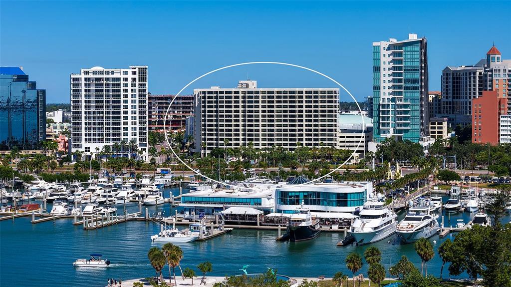 1255 North Gulfstream Avenue, Unit 1101 Sarasota, FL 34236 - Photo 58 of 75 a view of residential buildings and lake view
