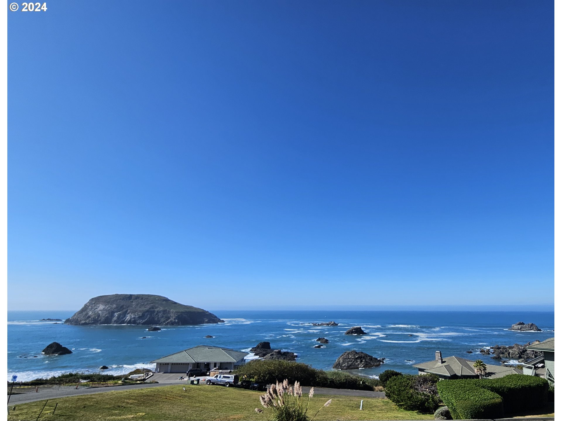 96448 Shorewood Terrace Brookings, OR 97415 - Photo 33 of 48 an aerial view of residential building and ocean view