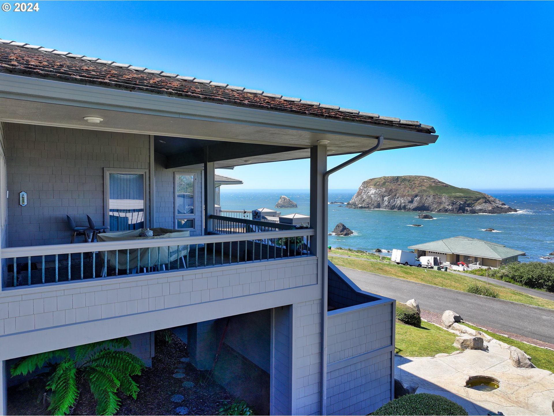 96448 Shorewood Terrace Brookings, OR 97415 - Photo 5 of 48 a view of a balcony with furniture