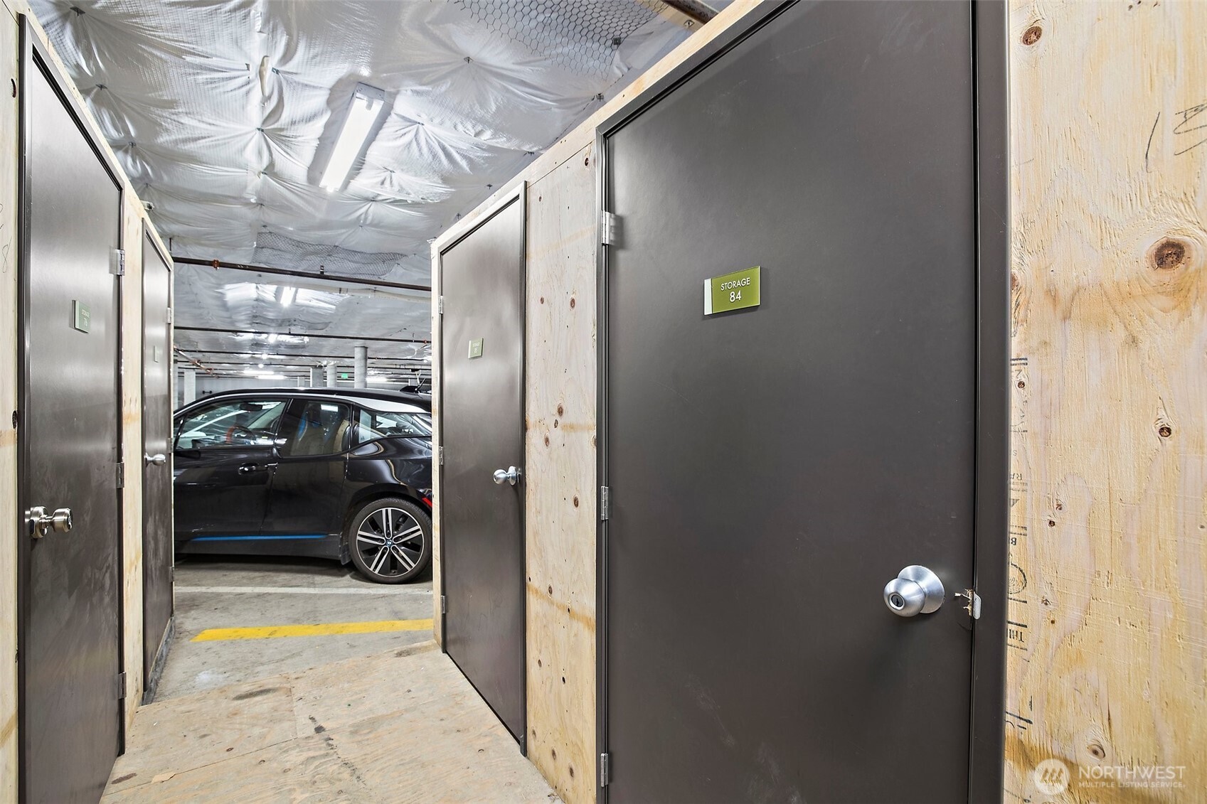 827 Hiawatha Place South, Unit 313 Seattle, WA 98144 - Photo 20 of 25 a view of a car garage door