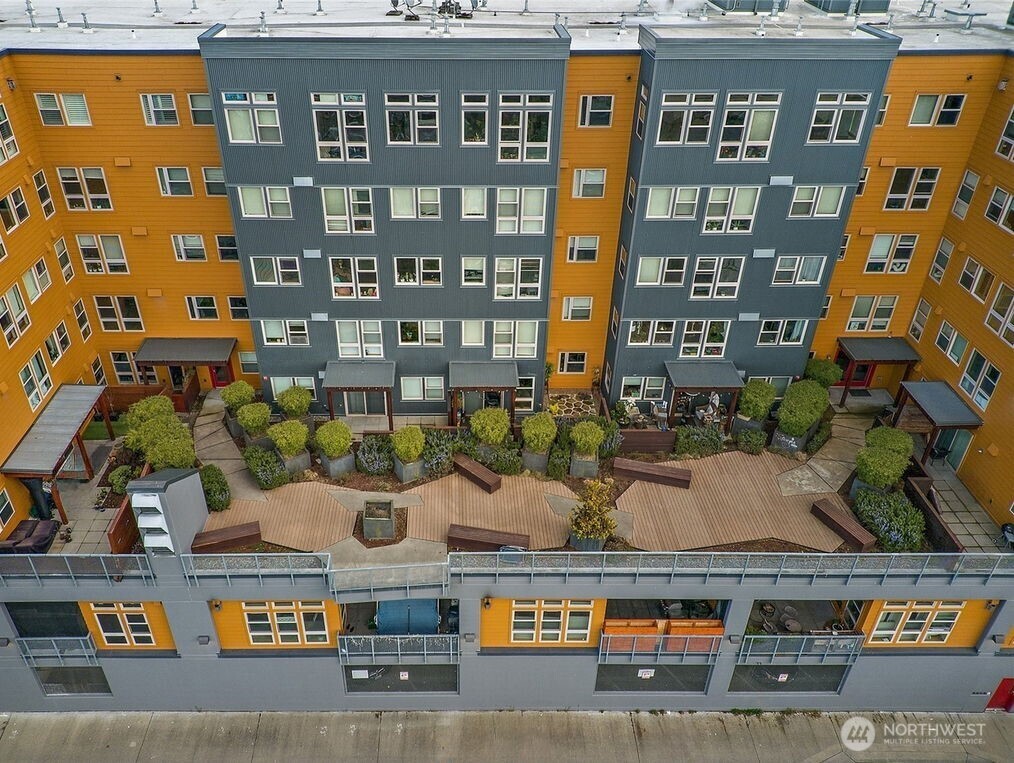 827 Hiawatha Place South, Unit 313 Seattle, WA 98144 - Photo 25 of 25 a view of building with outdoor space