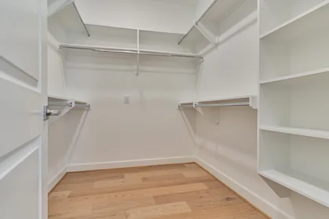 a view of a room with racks on the wall