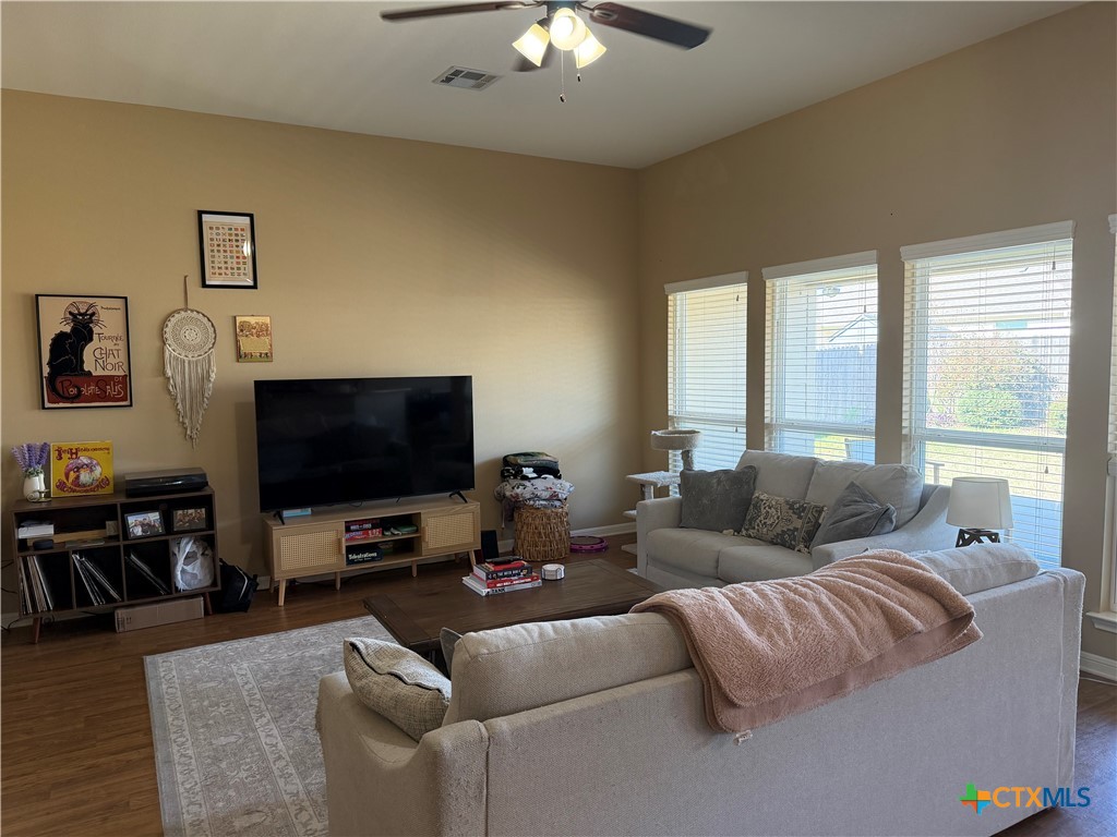 1126 Neuberry Cliffe Temple, TX 76502 - Photo 15 of 19 a living room with furniture and a flat screen tv