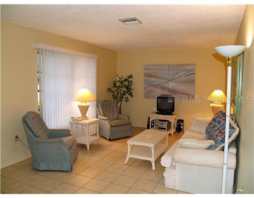 Living Room - Large Living Room with big windows facing front yard.